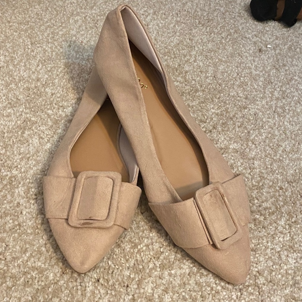 Pointed toe slip ons